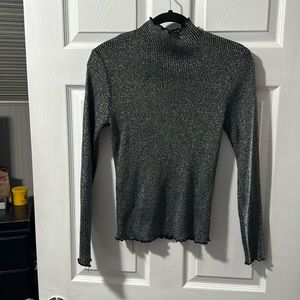 Mock neck top with ruffle trim